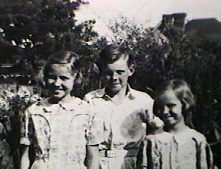 picture taken approximately 1938 on East Thomas in the yard